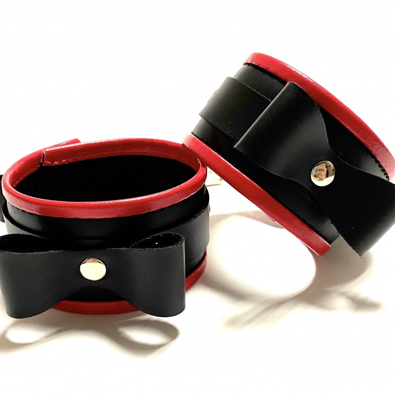 Наручники с бантиками из эко-кожи черно-красные 50008ars